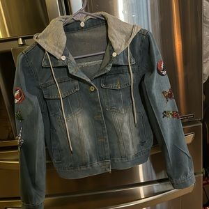 Grateful Dead Jean Jacket with hoodie.  Fits like a medium.  Never been worn